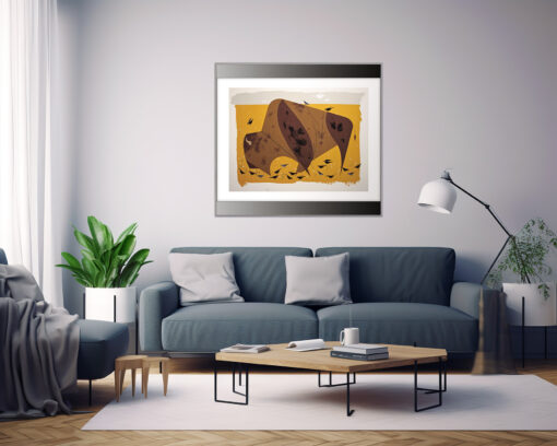 Framed artwork of a stylized American bison in shades of brown against a golden yellow background, surrounded by small blackbirds in flight. The piece is hung on a light gray wall above a modern teal sofa with gray and white throw pillows. The room features a mid-century modern coffee table, a white floor lamp, a green houseplant, and natural light streaming through white curtains.