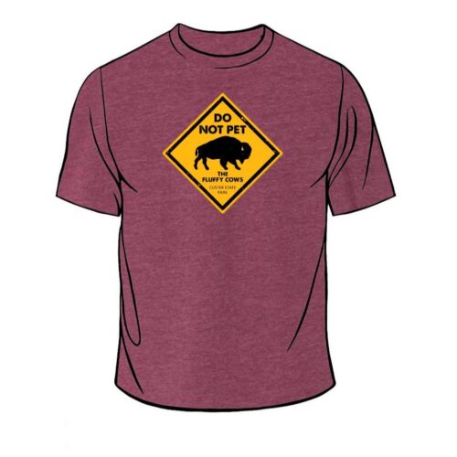 Don't Pet the Fluffy Cow shirt. Maroon color short sleeve t-shirt with yellow diamond warning sign with the text and an icon of a bison. Custer State Park underneath.