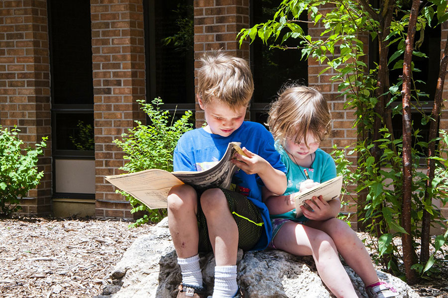 Junior-Rangers-Working-on-Activity-Books-Upclose
