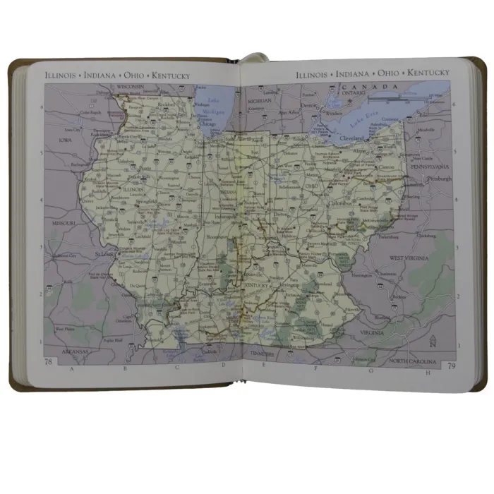 Open atlas displaying a full-color regional map of Illinois, Indiana, Ohio, and Kentucky with roads, parks, and cities labeled.
