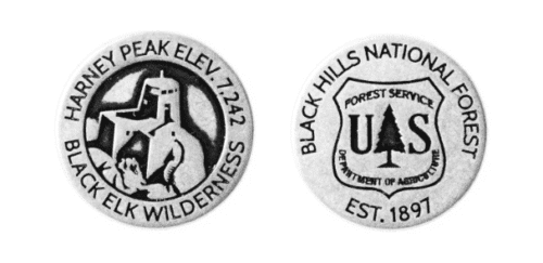 Black Hills National Forest collectible token, both sides