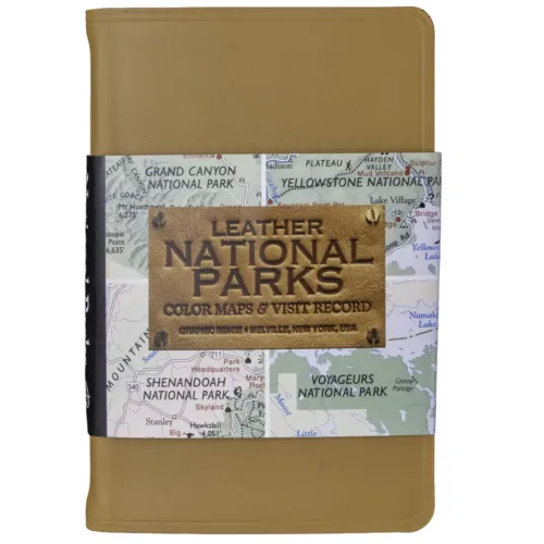 Front of leather-bound National Parks atlas wrapped in a printed sleeve. Sleeve lists contents including 98 color maps, 50 pages of park details, and 45 journaling pages. Tan leather cover is visible at top and bottom.