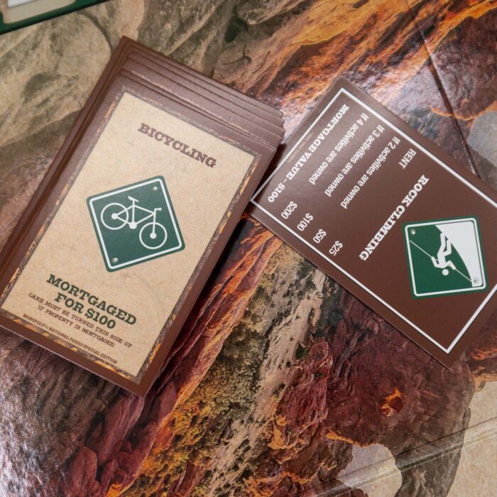 Detail shot of National Park Monopoly board with cards.