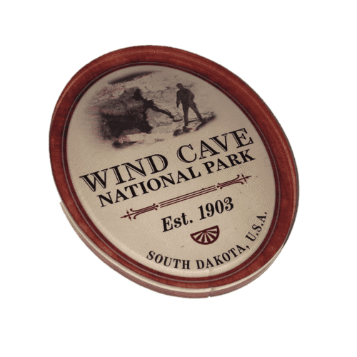 Wind Cave National Park oval resin magnet with a vintage sepia cave-entrance design