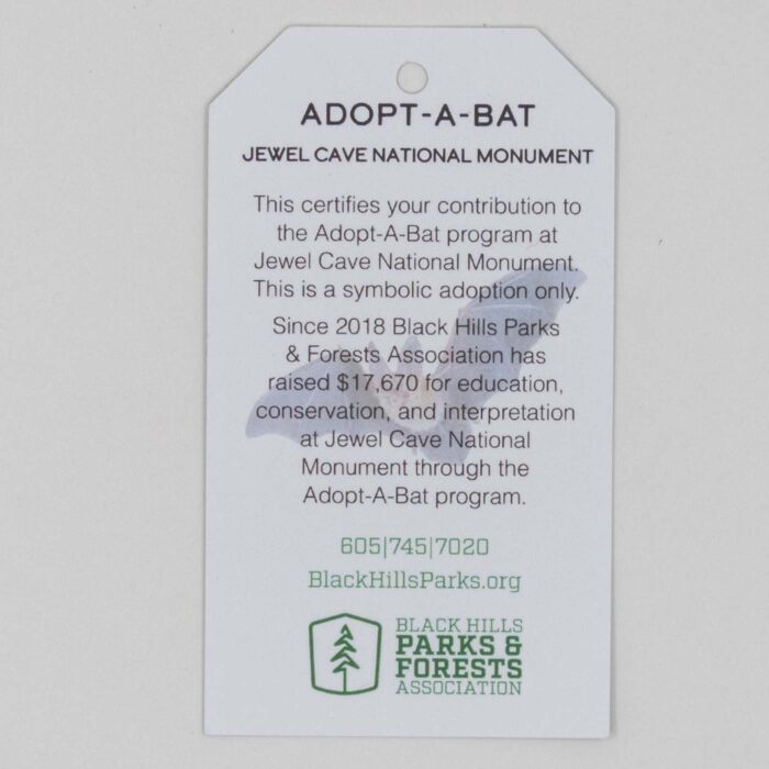 Back of the Adopt-A-Bat tag describing the symbolic adoption program at Jewel Cave National Monument.
