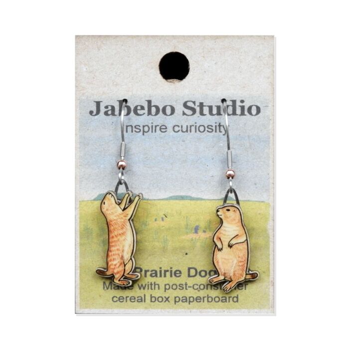Jabebo Studio dangle earrings shaped like prairie dogs, made of layered recycled paperboard, shown on the product card.