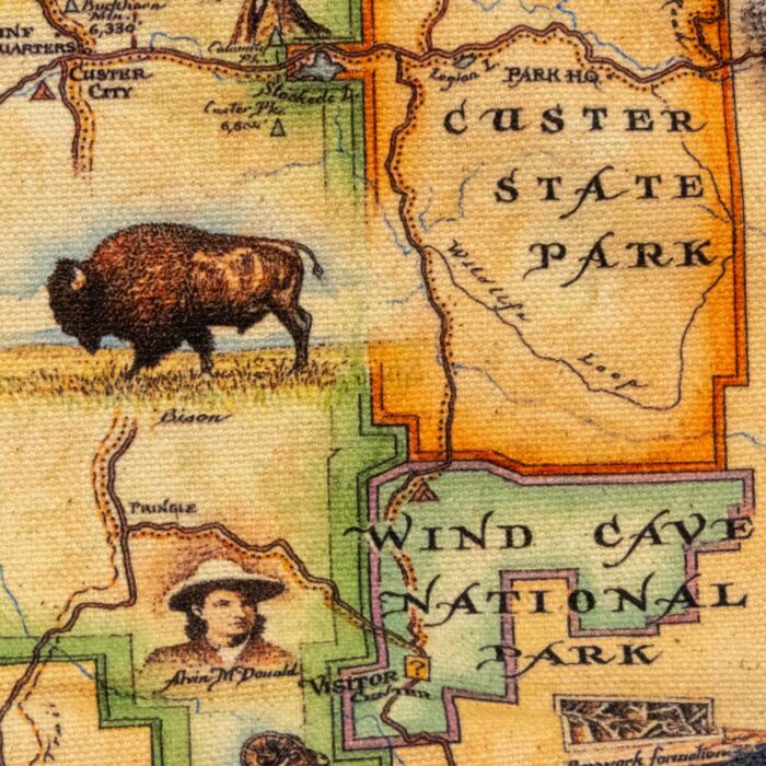 Tote print detail showing Wind Cave National Park, Custer State Park, a bison, and Alvin McDonald