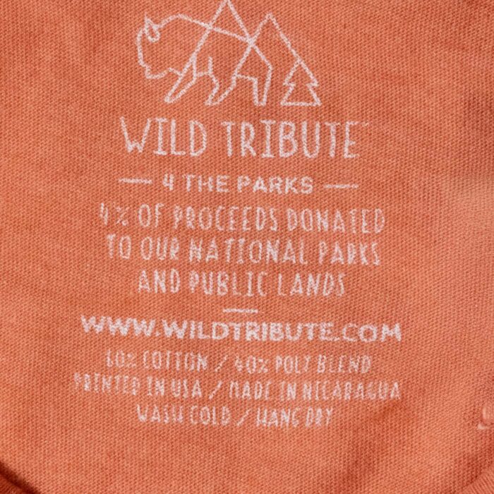 Inside neck label: Wild Tribute 4 the Parks, 60 percent cotton 40 percent poly blend, printed in USA, made in Nicaragua, wash cold hang dry