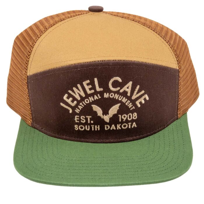 Jewel Cave National Monument camper hat, front, tan and brown panels with a flat green bill and embroidered bat