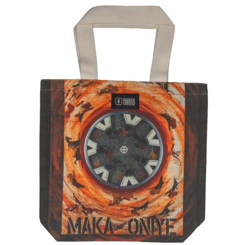 Maka Oniye recycled canvas tote bag, front, with Jim Yellowhawk's artwork of seven tipis circling a dark center on an orange swirl