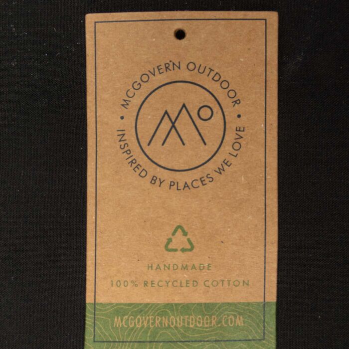 McGovern Outdoor hang tag on the Scotts Bluff canvas tote bag, marked handmade and 100 percent recycled cotton