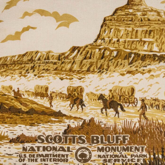 Detail of the wagon train artwork on the Scotts Bluff canvas tote bag