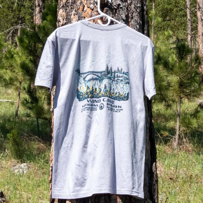 Wind Cave National Park bison and bridge t-shirt outdoors in a pine forest, back with the Beaver Creek Bridge scene