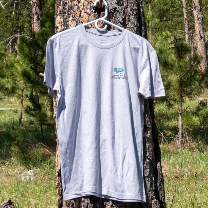 Wind Cave National Park bison and bridge t-shirt on a hanger in a ponderosa pine forest, front