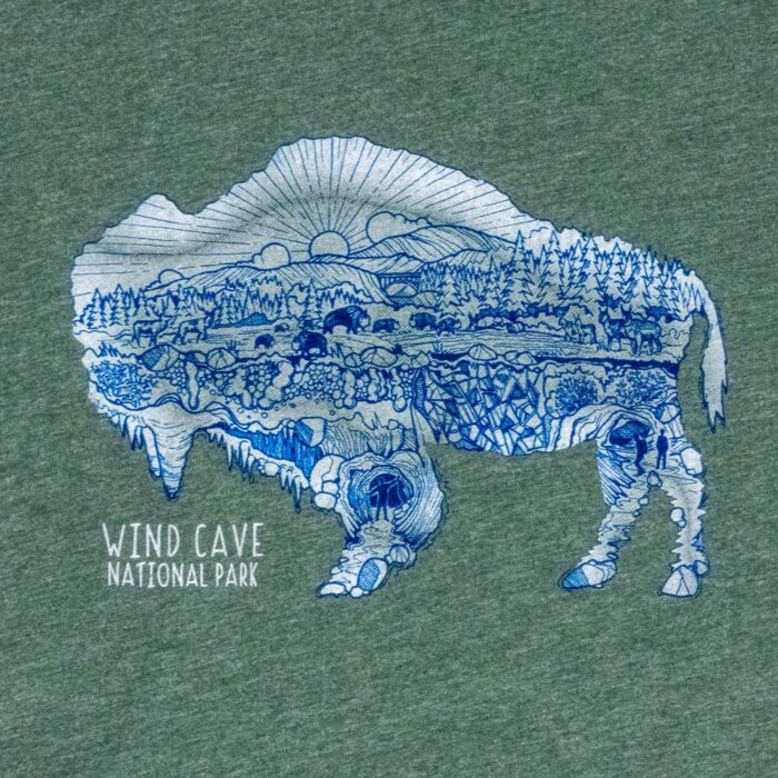 Print detail: a bison outline filled with sunrise, hills, pine forest and a grazing bison herd above a ground line, and cave passages, hanging formations and boxwork fins below it