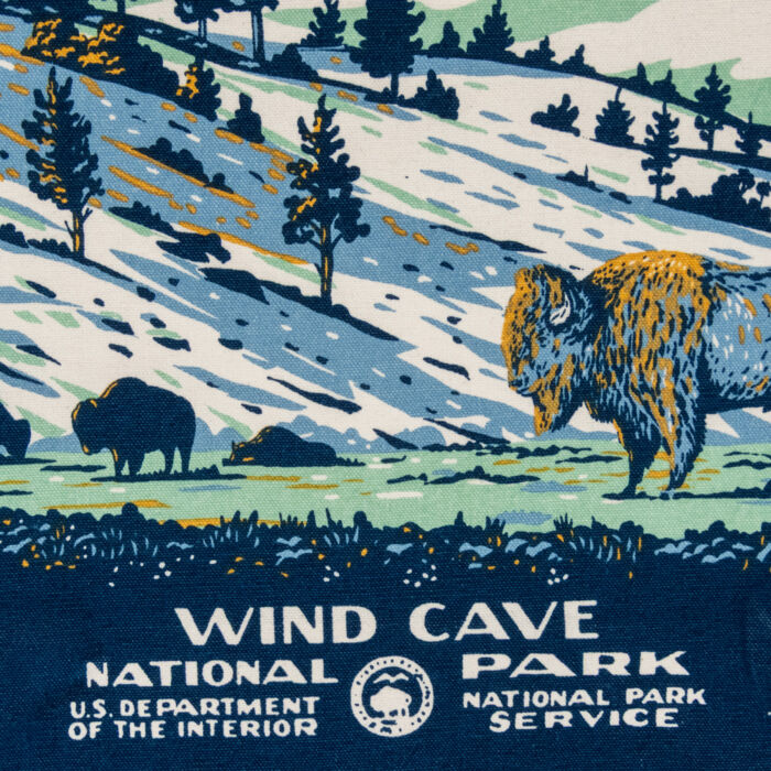 Close-up of Wind Cave National Park name band, NPS arrowhead, and bison on the canvas tote bag