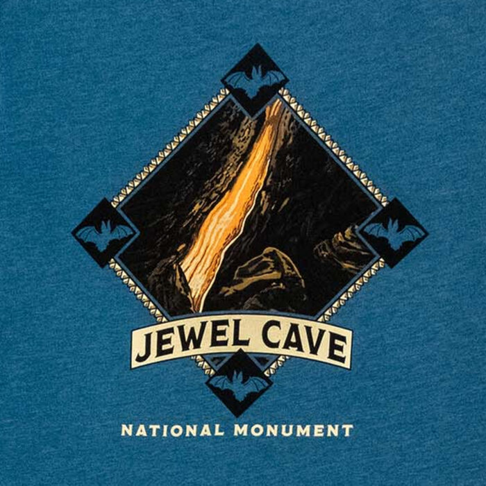 Close view of the print: orange and cream banded cave bacon lit from behind, ringed by four bats and a Jewel Cave banner.