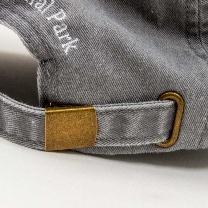Adjustable fabric strap and metal buckle on prairie dog hat