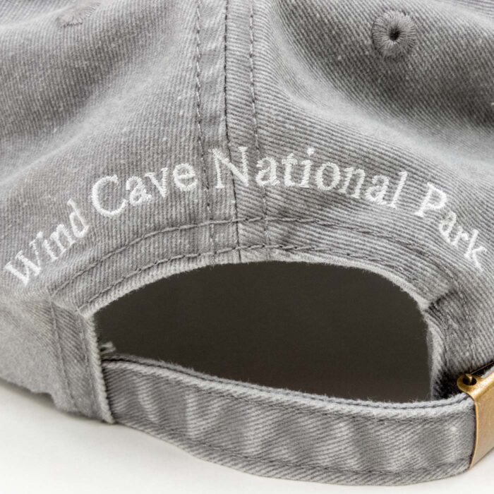 Close-up of Wind Cave National Park embroidery on the back of the hat